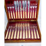 A good quality complete set of 12 silver engraved fish knives & forks with ivory handles Sheffield