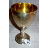 A 19th century silver goblet with bead e