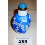 A Chinese overlayed snuff bottle decorat