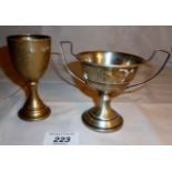 A two handled silver trophy cup and anot