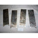 Four Chinese white metal plaques decorat