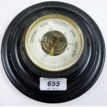 An ebonised barometer est: £30-£50 (N2)