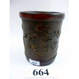 A Chinese bamboo brush pot carved with f