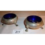 A pair of Victorian silver salts on pad