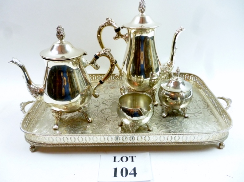 A silver plated galleried tray and a fou