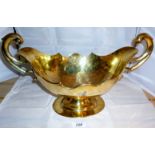 A large silver two handled gilded boat s