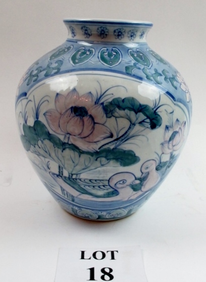 A Chinese bulbous blue and white vase wi