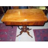 A 19c pale mahogany turn over tea table on a turned column and four splayed legs est: £80-£120