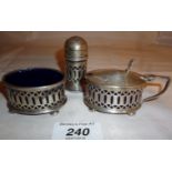 A three piece silver condiment set with