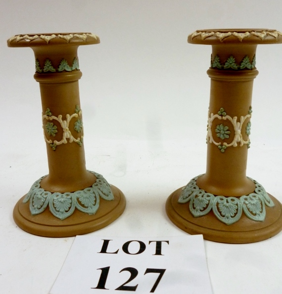 A pair of Doulton Silicon ware candlesti