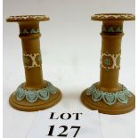 A pair of Doulton Silicon ware candlesti