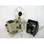 A vintage Eumig P8 projector together with a Boots Cine Editor 3,