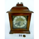 A Westminster chime mahogany and glazed case mantle clock with presentation plaque dated 1956 and