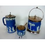 Three pieces of Wedgwood blue Jasperware with plated mounts to include a biscuit barrel (3) est: