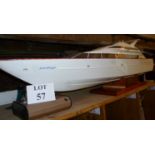 A large motor pond yacht modelled as a speed boat with remote control (untested) est: £40-£60 (AB1)