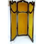 A Victorian carved mahogany and velvet lined three fold screen est: £50-£80 (O)