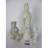 Three Chinese blanc de chine figurines modelled as Buddha or Guyuain (a/f) est: £30-£50 (F29)