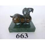 A bronze model of a goat after the antique on a marble base est: £50-£80 (K1)