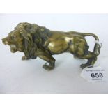 A brass model of a lion est: £30-£50 (K1)