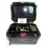A 19th century Chinese black lacquer and gilt sewing box with bone sewing items (a/f) est: £40-£60