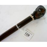 A fine quality rosewood Lignum Vitae Imago handled cane with a silver collar est: £120-£220 (J)