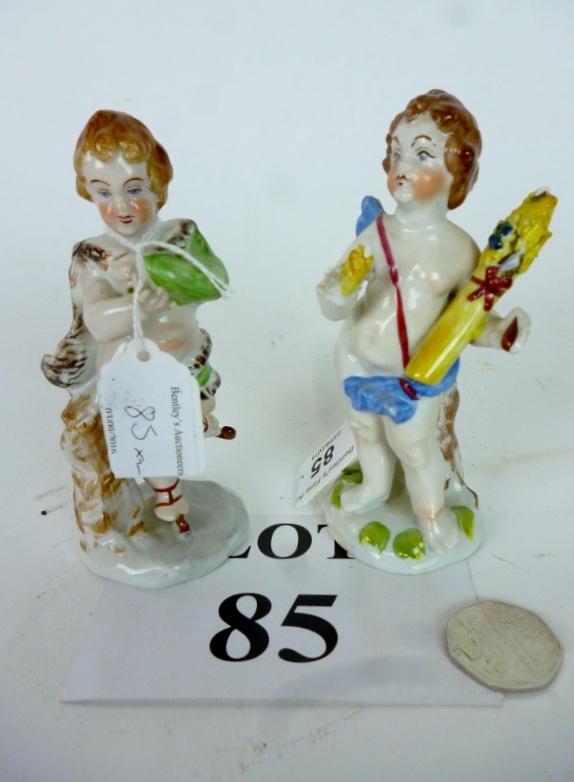 A pair of 19c cherub figurines est: £25-£45 (O1)