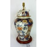 A large decorative Oriental table lamp base decorated with peony flowers in Imari colours and gilt