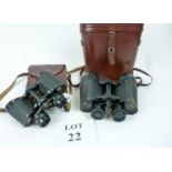 Two pairs of cased binoculars,