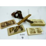 A stereoscopic viewer together with a collection of assorted viewing cards to include Colonial and