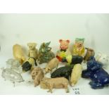 A collection of novelty 'pig' theme ornaments, money box,