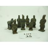 A set of eight Chinese 'bronzed' terracotta Army figurines est: £30-£50 (A1)