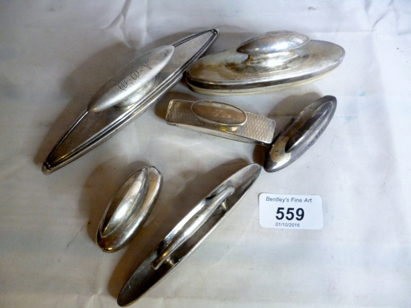 A collection of six various silver nail