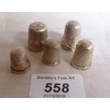 A collection of five thimbles four hallm