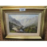 A framed oil on canvas, mountainous land