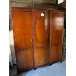 A c1900 mahogany triple wardrobe with bo