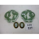 A pair of green Jasperware figural carto