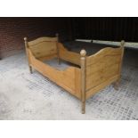 A 19c pine sleigh bed (single) est: £70-