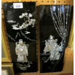 A pair of black lacquered panels depicti