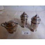 A three piece silver condiment set Sheff