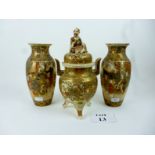 A garniture of Japanese Satsuma vases wi