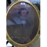 An oval gilt framed and glazed charcoal