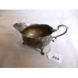 A Georgian silver sauce boat (repairs) e