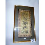 A framed and glazed finely worked silk p