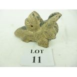 An unusual carved stone mythical animal,