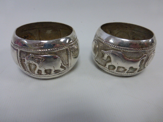 An Erik Frithiot Poulsen white metal napkin ring with embossed elephant design, stamped E.F. - Image 2 of 3