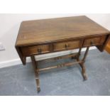 Regency style drop leaf sofa table with three frieze drawers, on turned end supports,