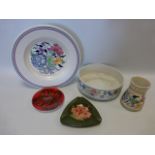 Moorcroft Hibiscus pattern ashtray, and four items of Poole Pottery.