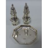 Pair of silver pepperettes hallmarked London 1918 by Pairpoint Bros,