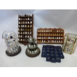 Collection of 229 assorted china, metal, wood and glass thimbles on two wall mounted display