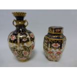 Royal Crown Derby Imari pattern 15.5cm vase and hexagonal jar with cover 11.5cm high.